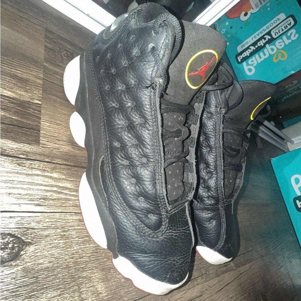 Air Jordan Retro 13 Black Leather Sneakers with Red Accents